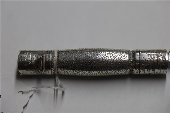 A Victorian silver novelty double scent bottle modelled as a cracker, inset enamel panel, by Samuel Mordan & Co., London 1883